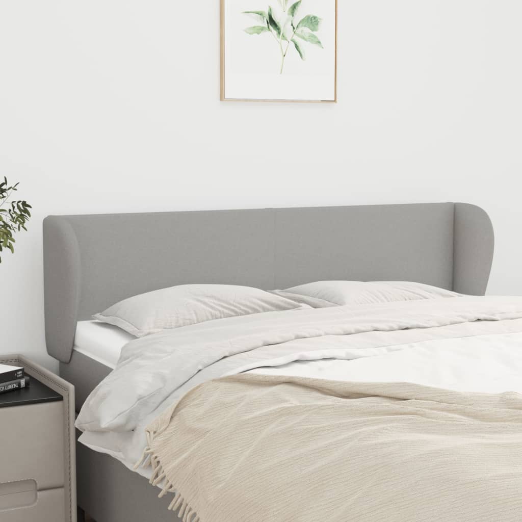 Hoofdbord met randen 147x23x78/88 cm stof lichtgrijs – afbeelding 1