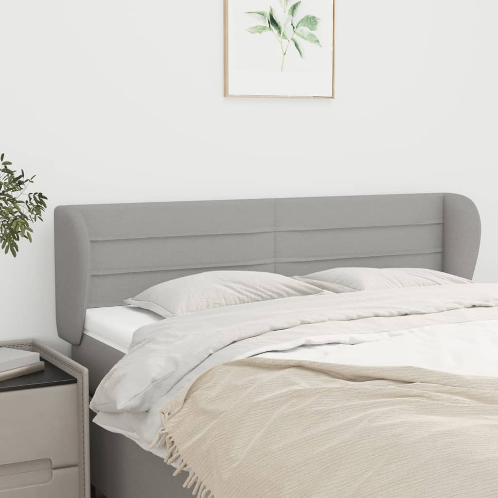 Hoofdbord met randen 147x23x78/88 cm stof lichtgrijs – afbeelding 1
