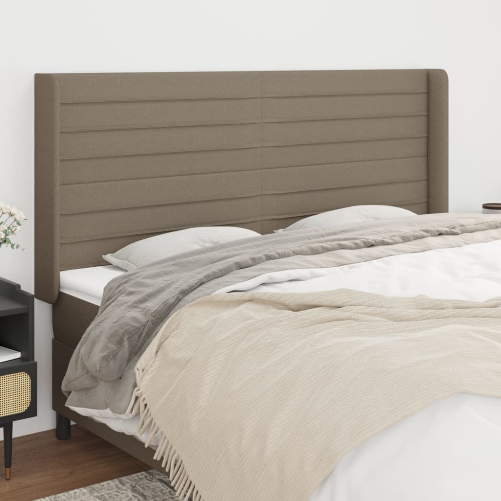 Hoofdbord met randen 183x16x118/128 cm stof taupe – afbeelding 1