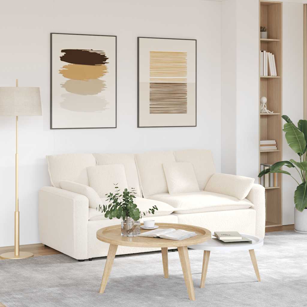 Modulaire bank met kussens crèmekleurig